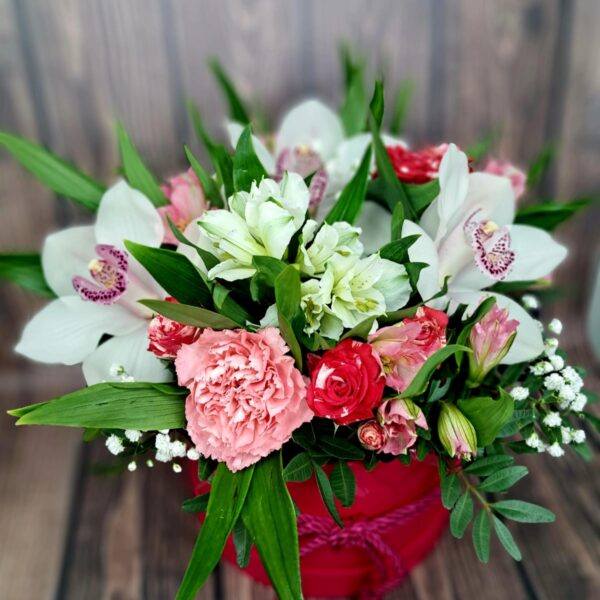 Pink Waltz flower box with pink roses orchids alstroemeria carnations and greenery