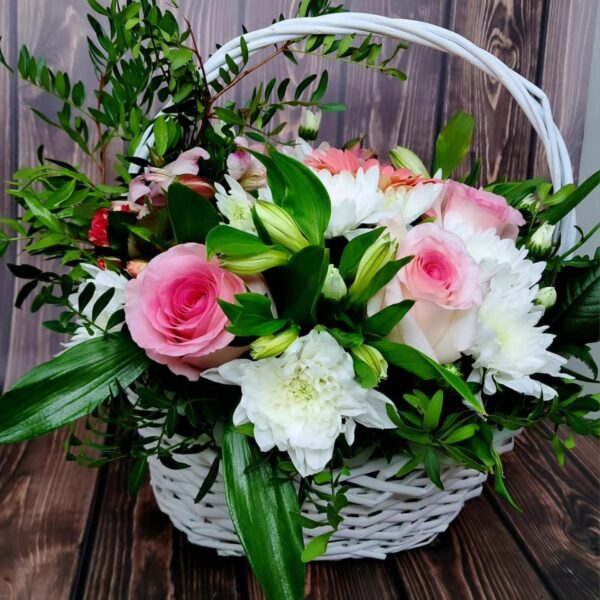 A Basketful of Joy flower basket arrangement with roses white chrysanthemums alstroemeria and pink carnations