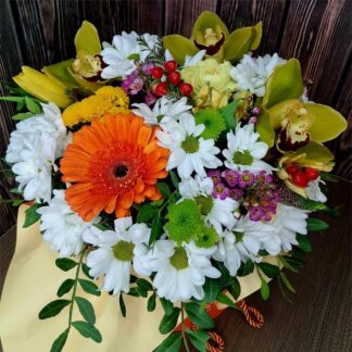 Confetti Garden colorful flower box with orchids gerberas chrysanthemums hypericum and fresh greenery