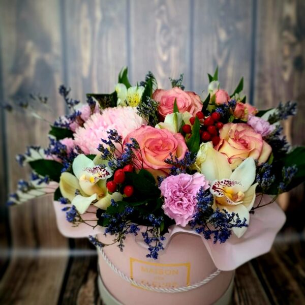 Watercolor Dreams flower box with roses orchids alstroemeria carnations and fresh greenery