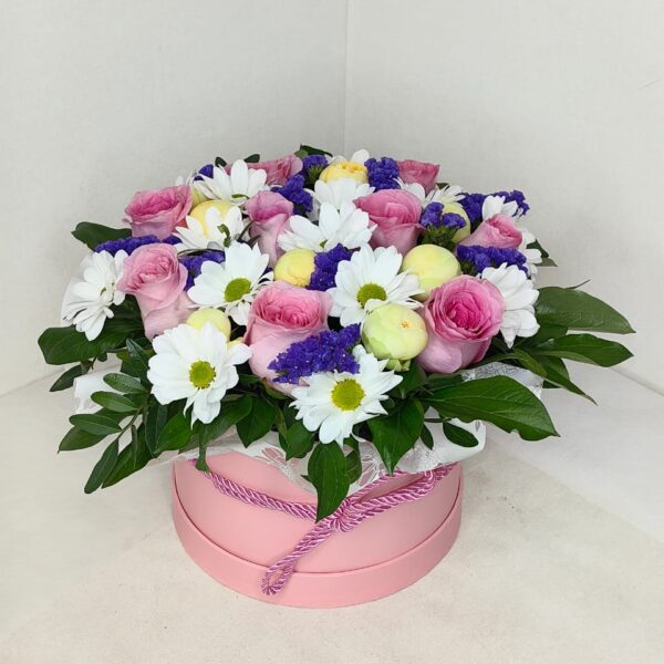 Pink Nocturne pink roses in a flower box with statice and fresh eucalyptus