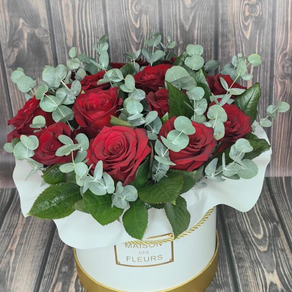 Rapture red rose bouquet with fresh eucalyptus in a white flower box