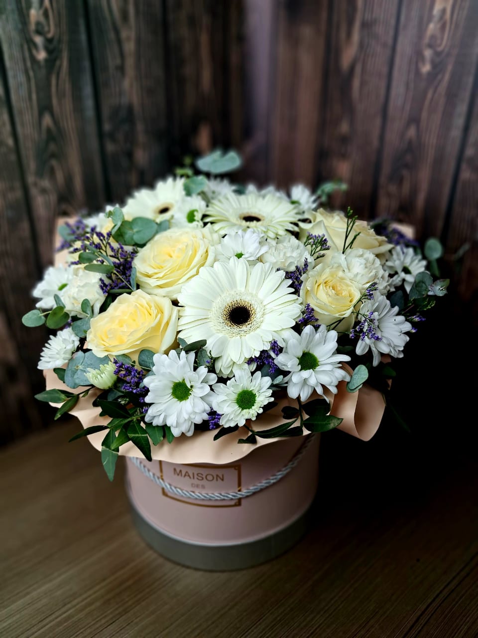 Gentle Sunbeam bouquet with white roses, gerberas, chrysanthemums and eucalyptus