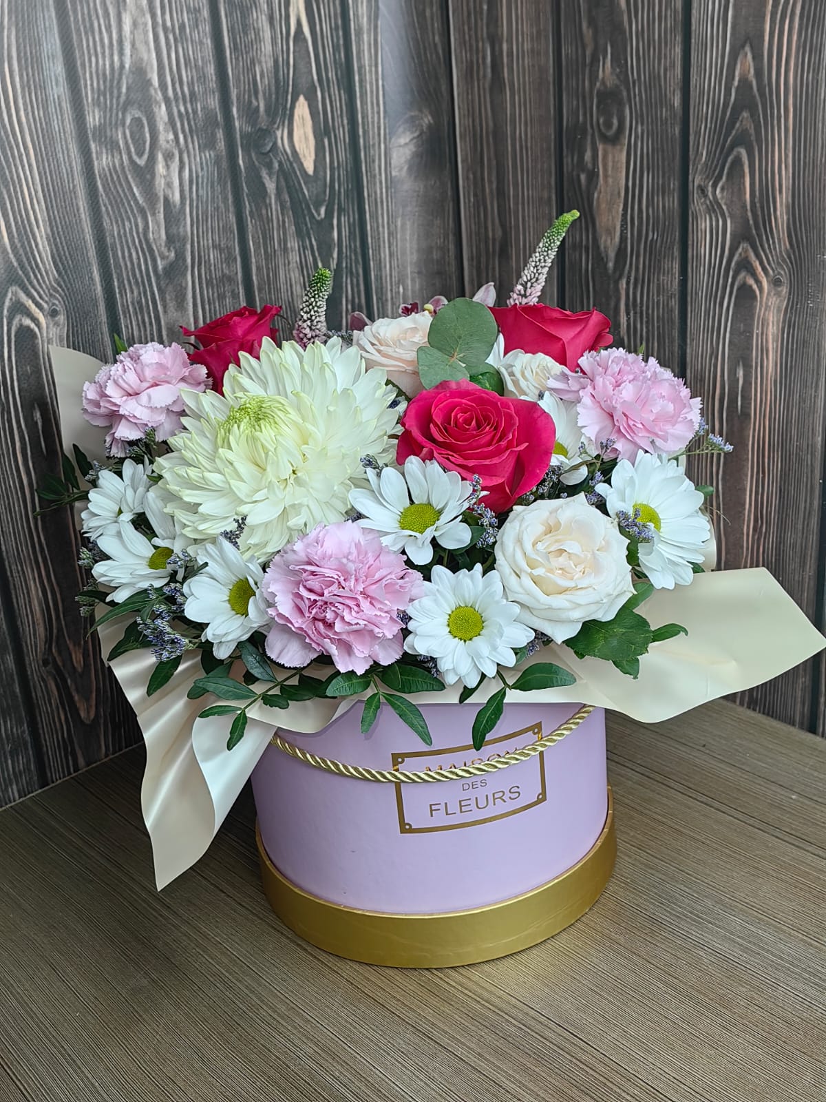 Petal Daydream pink flower bouquet with roses, carnations, chrysanthemums and daisies in a hat box