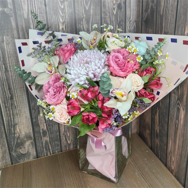 Carried by the Breeze bouquet with pink roses orchids alstroemeria chrysanthemums and eucalyptus