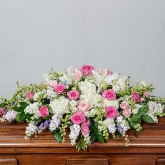 Elegant Funeral Flower Arrangement with White Chrysanthemums, Pink Stock, Pink Roses, and White Lilies