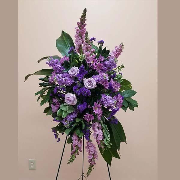 Funeral Floral Arrangement with Roses, Statice, and Matiola in Lilac