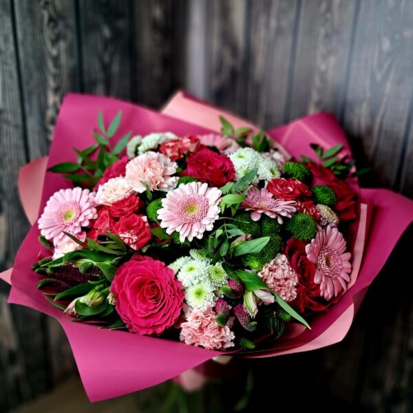 Pink Garden Glow bouquet with pink roses, gerberas, alstroemeria, chrysanthemums and greenery