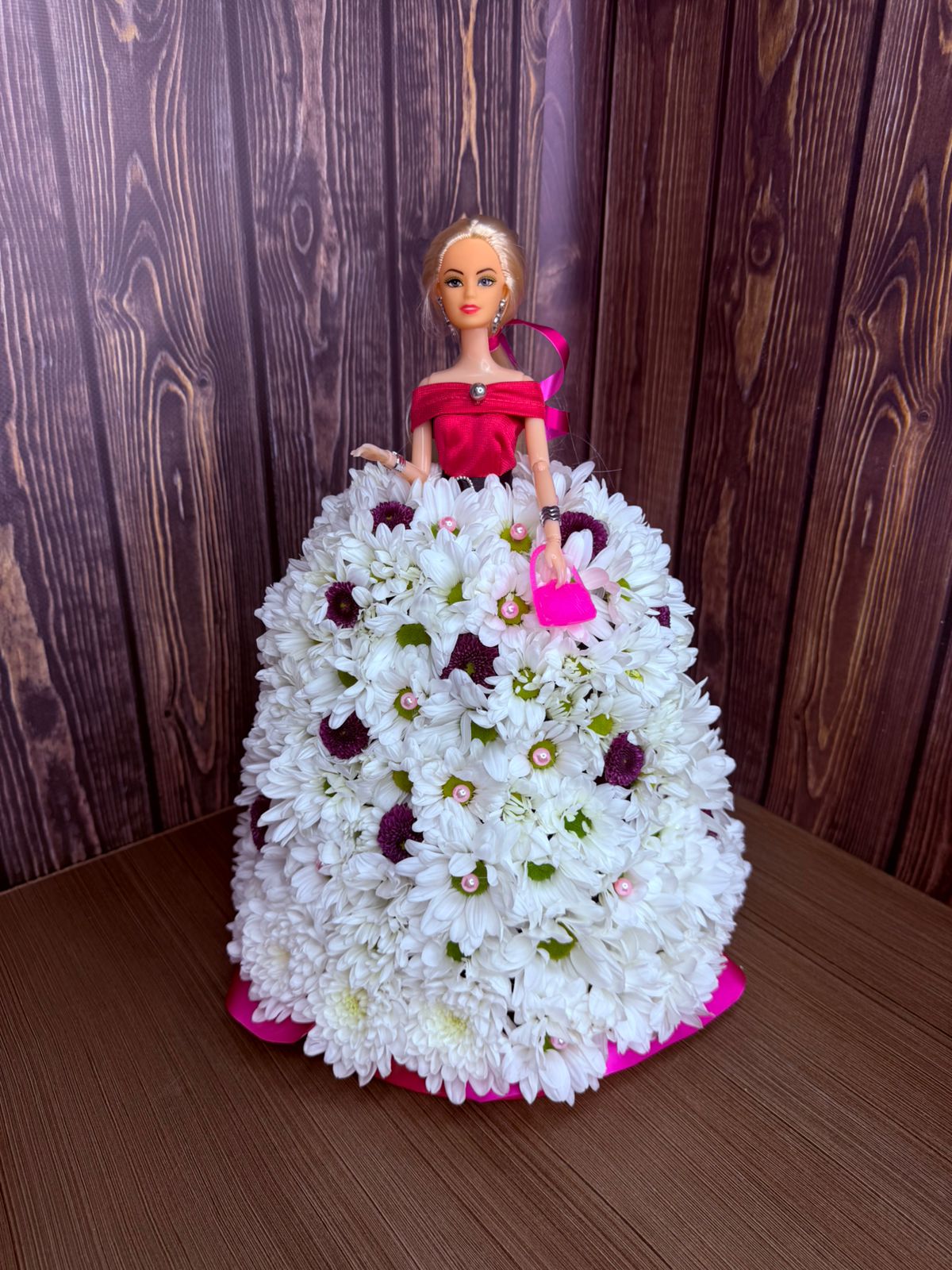 Floral Doll with a charming doll dressed in a dress made of fresh flowers