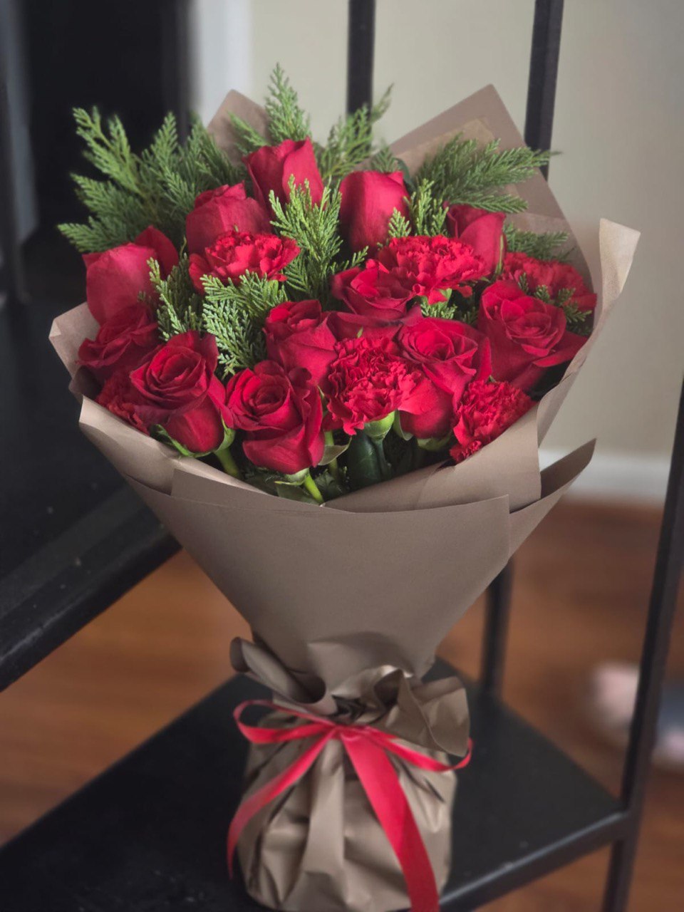 An ELEGANT bouquet with red roses and carnations