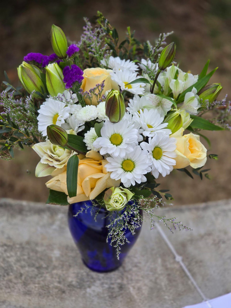 "Tender Dream" bouquet with fragrant lilies and roses, complemented by limonium