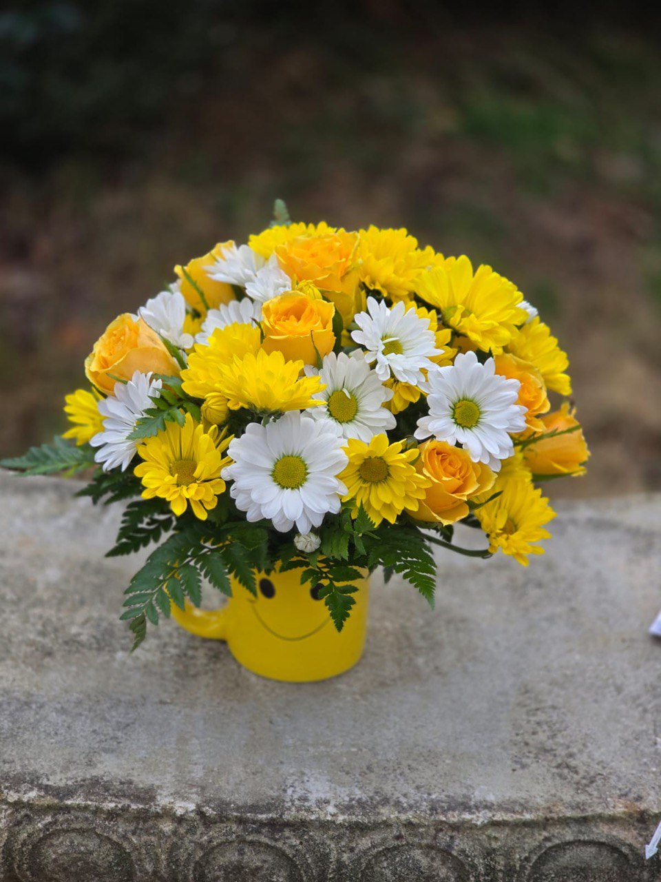 A bouquet in a bright mug with yellow roses and white and yellow chrysanthemums - Image 2