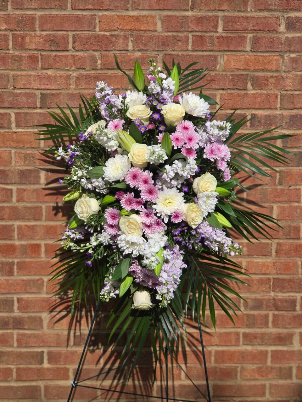 Funeral Standing Sprays & Wreaths on chrysanthemum, lily - a symbol of eternal memory and sorrow