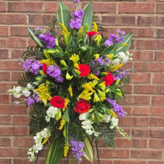 Funeral Standing Sprays & Wreaths with yellow lily, matthiola and red rose: a symphony of color