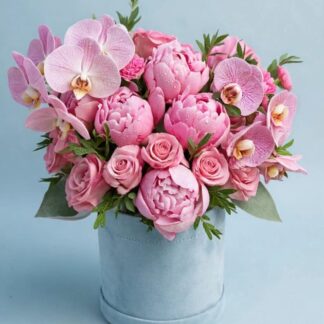 Pink peony, rose and orchid bouquet in a blue box