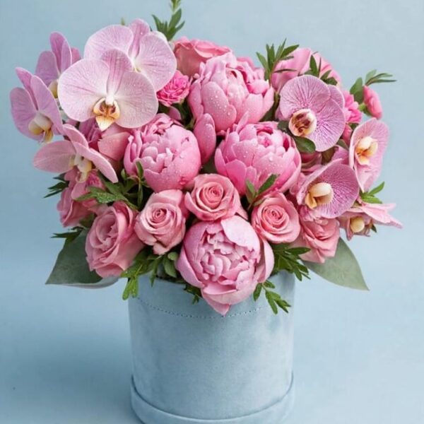 Pink peony, rose and orchid bouquet in a blue box